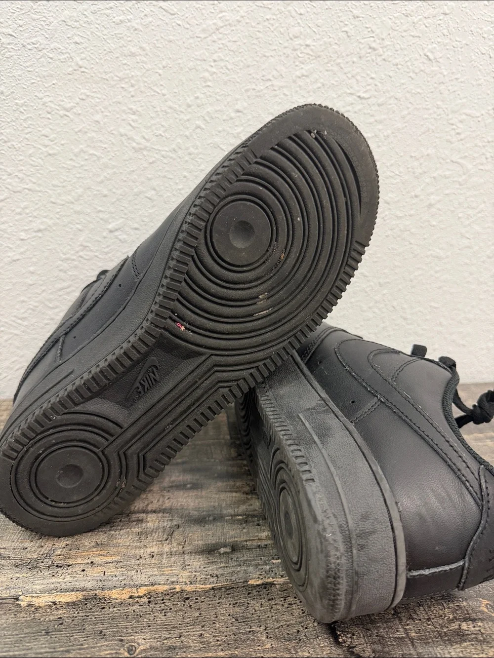 Nike Men's All-Black Leather Low-Top Sneakers